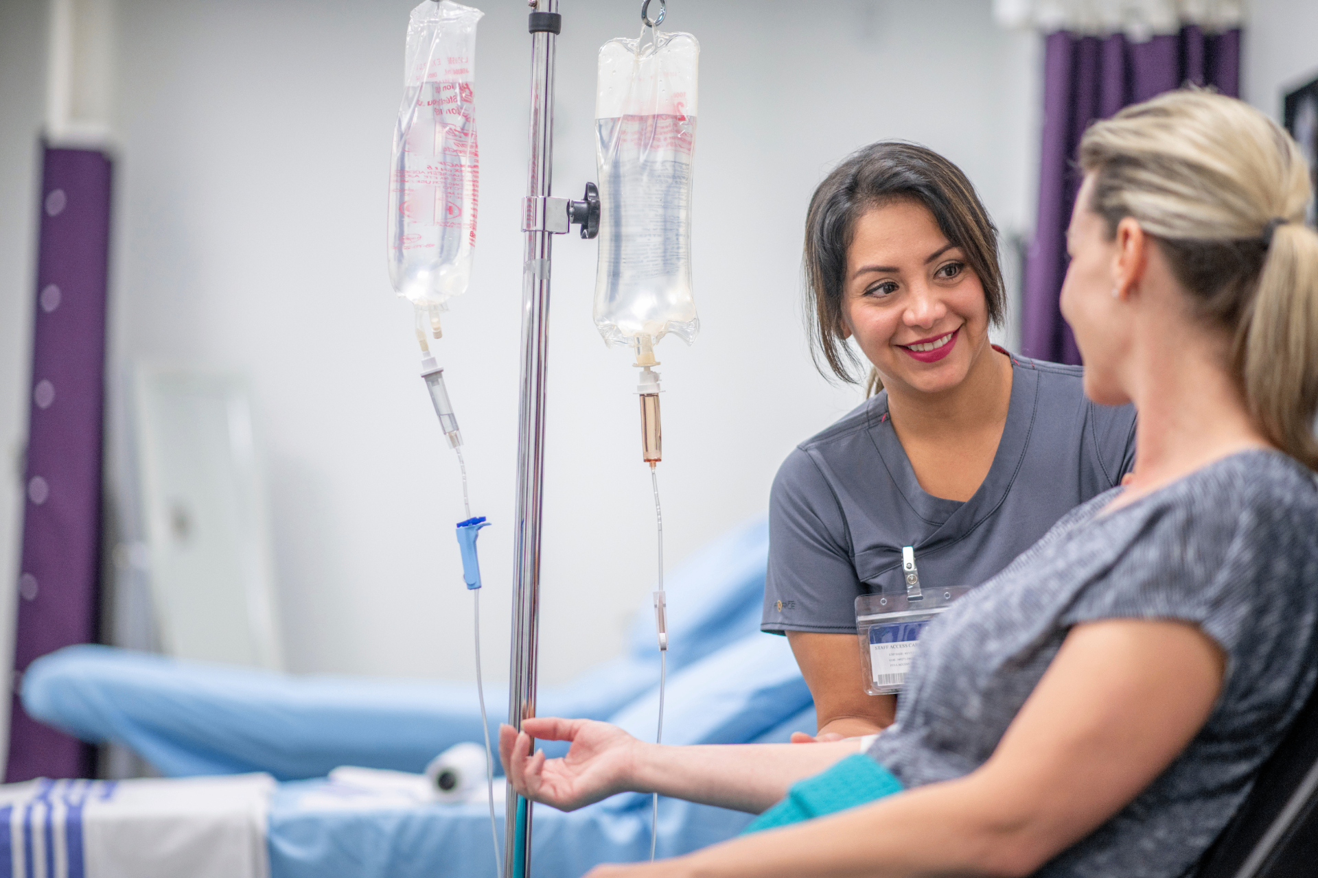 Registered Nurse with a guest during a stem cell IV infusion at iCRYO Mauldin